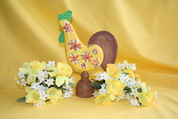 Image showing Easter cock  surrounded of daffodils