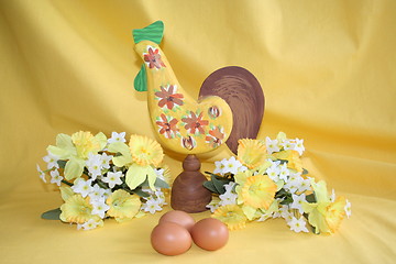 Image showing Easter cock  with daffodils and eggs