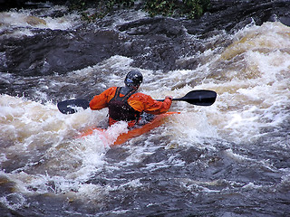 Image showing against the waves