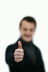 Image showing Congratulations - Young man giving thumbs up