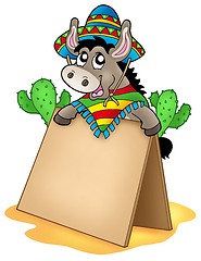 Image showing Mexican donkey with wooden table