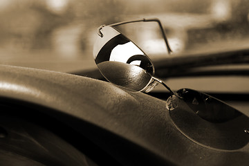 Image showing Sunglasses on the deck