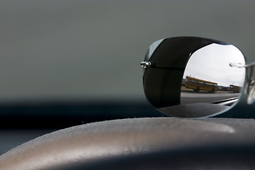 Image showing Sunglasses on the deck