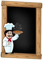 Image showing Blackboard with chef holding pizza