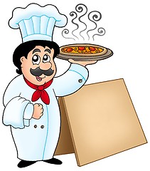 Image showing Chef holding pizza with table