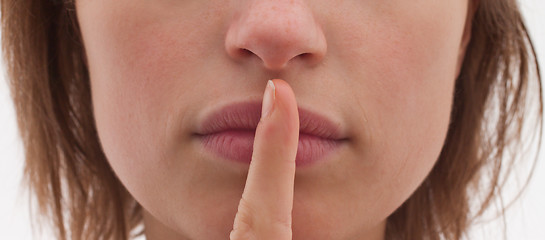 Image showing Shh - Cut out of woman with finger to lips