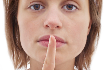 Image showing Silence - Cut out of woman with finger to lips