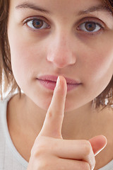 Image showing Be Quiet - Cut out of woman with finger to lips