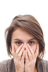 Image showing Woman covering her face with hands