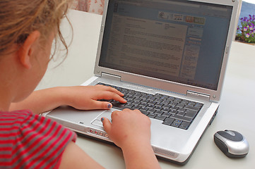 Image showing Girl at her laptop.