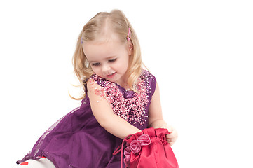 Image showing Studio shot of baby girl in gala dress