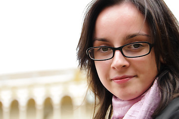 Image showing Young girl with glasses and scarf