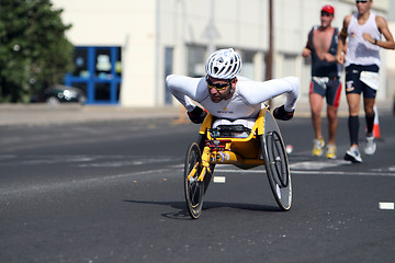 Image showing Disabled athlete in a sport wheelchair in Lanzarote marathon 200