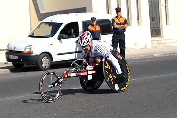 Image showing Disabled athlete in a sport wheelchair in Lanzarote marathon 200