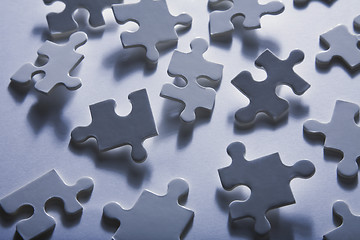 Image showing Jigsaw Piece with Dramatic Light