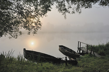 Image showing Boats at a sunrise