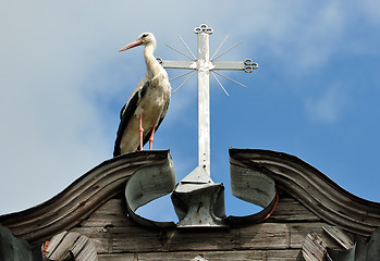Image showing Stork and a cross