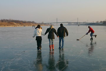 Image showing Family walking on ice