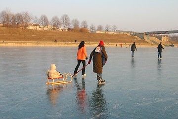 Image showing Ice-skating family