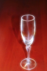 Image showing abstract scene of the liquor-glass on varicoloured background