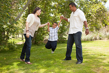 Image showing Young Hispanic Family Having Fun in the Park