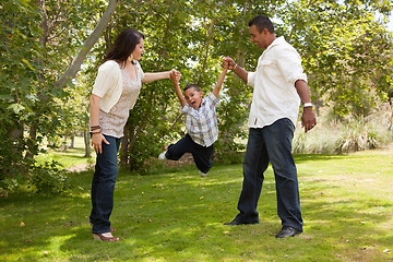 Image showing Young Hispanic Family Having Fun in the Park