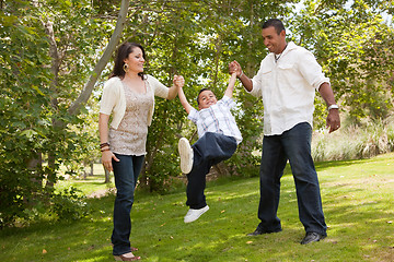 Image showing Young Hispanic Family Having Fun in the Park