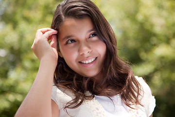 Image showing Cute Happy Hispanic Girl in the Park