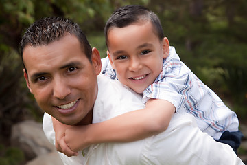 Image showing Hispanic Father and Son Having Fun in the Park