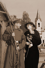 Image showing Retro style picture with woman and soldier