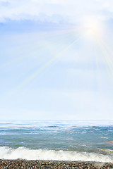 Image showing sea beach and glow summer sky