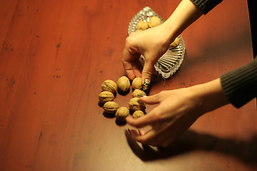 Image showing ripe nut on table