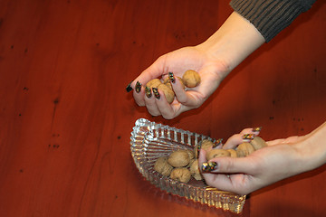 Image showing ripe nut on table