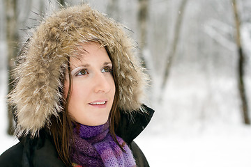 Image showing Woman in forest with fur hood