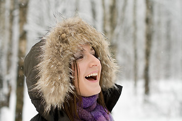 Image showing Woman in forest with fur hood