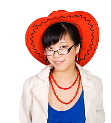 Image showing Asian woman in big red hat