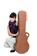 Image showing Asian woman with guitar case