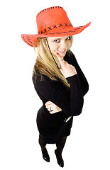 Image showing Blond woman making decision in red cowboy hat on white backgroun