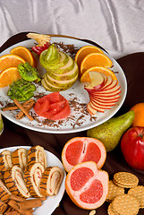 Image showing Set of sweet fruit and cake