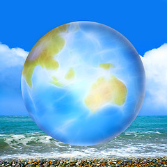 Image showing abstract scene with planet and sea beach