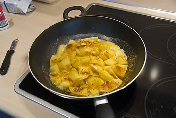 Image showing Potatoes roasted in frying pan.