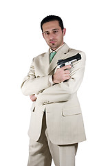 Image showing Mafia with arms crossed and a gunon hand