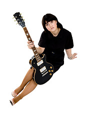 Image showing Woman sitting with guitar