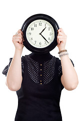 Image showing Cacasian woman holding wall clock