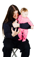 Image showing Lovely child and fearful long hair rocker