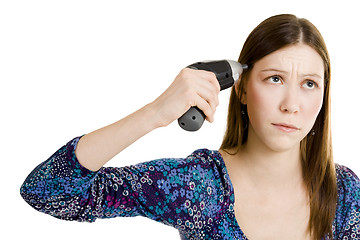 Image showing Woman shooting herself with screwdriver