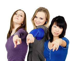 Image showing Three women pointing at you