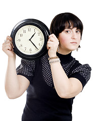 Image showing Cacasian woman holding wall clock