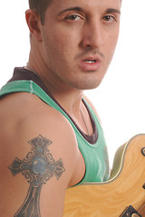 Image showing guitarist with large tattoo 2497