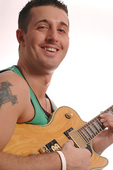 Image showing smiling guitarist 2503